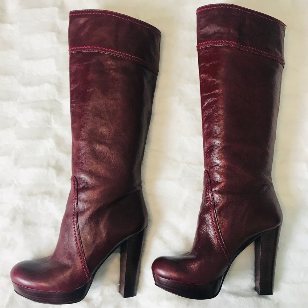 Vince Camuto red leather knee high platform boots.